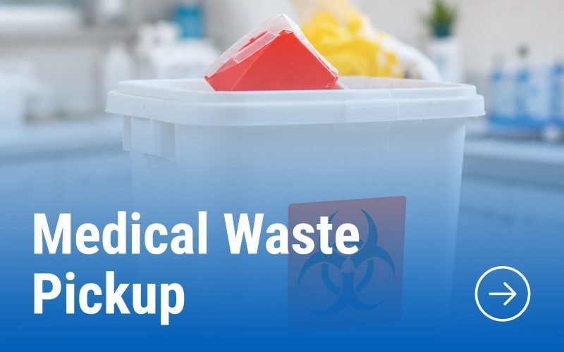 Medical waste disposal container with a biohazard symbol in a clinical environment.